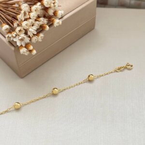 Pulseira de bolinhas dourada